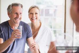 Maybe you would like to learn more about one of these? Smiling Mature Couple At Bathroom Mirror Horizontal Indoors Stock Photo 209608394