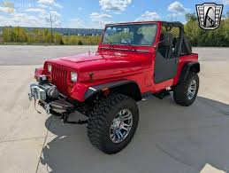 Image result for Poppy Red 1993 Jeep