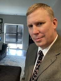 Vito Perrone's athletic career and coaching at Grand Forks Central