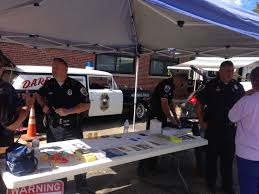 The Merrimack Police Community Services Officer Rob Kelleher Provides Visitors With Information On Programs And Resources Merrimack Community Service Police