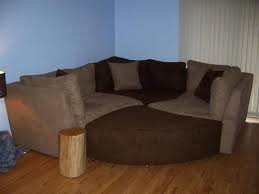 Puzzle Piece Sectional Sofamart Jig Saw Puzzle Couch With Ottoman And Lots Of Pillows In Rock Couch With Ottoman Couches For Sale Sectional Couch