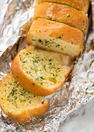 Mix parmesan cheese, butter, garlic powder, and parsley in a small bowl. Better Than Dominos Garlic Bread Recipetin Eats