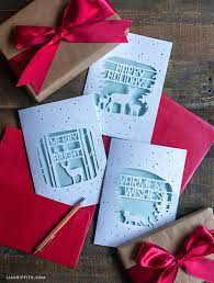 Purchase this product now and earn 30 points! Elegant Paper Cut Christmas Cards Lia Griffith