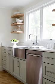 Sage green cabinets with black countertops. Sage Green Kitchen Cabinets Design Ideas