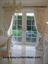 With minimal investments of time or money, you can make your home look like you spent a million bucks. Curtain Idea For French Doors French Door Curtains Old Door Decor French Door Window Treatments