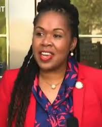 Trump Responds With a Nod and a Smile to QAnon Slogan