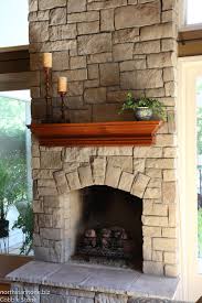 The Larger Pieces Of Stone Installed With A Mortar Joint And Decorative Keystones Over The Arched Firebox Opening Stone Veneer Stone Siding Stone Veneer Siding