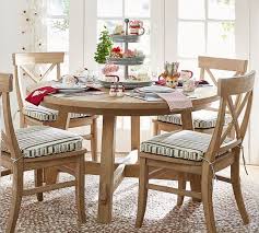 Crafted from a polypropylene blend, this artful rug stands up to high traffic areas, making it perfect for laying out under the dining room table or in the entryway. Border Round Braided Jute Rug Pottery Barn