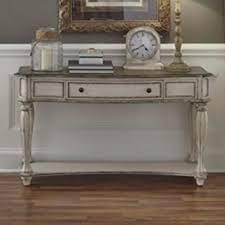 Warm antique finishes and artistic distressing along with a grand scaled group to be passed to generations. Belle Furnishings Magnolia Manor Sofa Table In Antique White Nebraska Furniture Mart