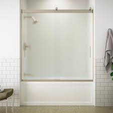 Bringing new technology and sleek style to the contemporary bath, levity shower doors feature an innovative bypass system and roller design that provide an amazingly smooth, quiet sliding action for a. Kohler Levity 59 In X 62 In Semi Frameless Sliding Tub Door In Bronze With Handle K 706000 D3 Abv The Home Depot
