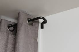 The holden wrap around curtain rod provides a sleek, high fashion style to your decor. Umbra Twilight Window Wrap Around Adjustable Double Blackout Curtain Rod Matte Black Home Decor Window Treatment Hardware Rayvoltbike Com