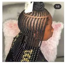 This braided bun is a stylish way of keeping your hair out of your face and off of your shoulders. Scooper Undefined News Amazing Hairstyle Your Little Girl Should Rock In This Christmas
