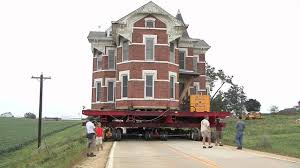 The Buchanan Mansion A 125 Year Old Brick House Near Tipton That Weighs More Than 400 Tons Started Rolling Down The Ro House Movers Moving House Henderson Nv