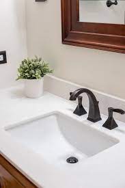 Always wear gloves and eye protection and work with at least one helper when prying a mirror loose and carrying it to a safe location outside the bathroom. How To Replace A Vanity Top And Save Craving Some Creativity