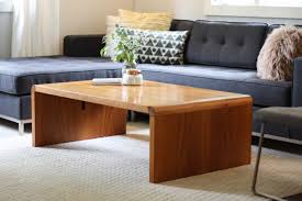 This coffee table takes an iconic waterfall silhouette, and gives it an airy upgrade with its slatted frame design. Teak Waterfall Coffee Table By Nae Denmark Mid And Mod