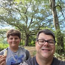 Trousdale County, Tennessee, 1900... Caption Group portrait of the Daniel  Smith family and a horse posed in front of their home in Hartsville. Daniel  Smith was an American Civil War veteran... Source