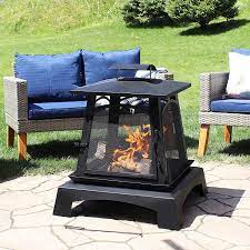 Backyard fire pits bring with them loads of benefits that do using a fire pit in an enclosed area will cause fumes from it to smother around and that can be. Buy Sunnydaze Pagoda Style Steel Fire Pit Metal Wood Burning Enclosed Outdoor Fireplace With Log Grate And Poker Modern Bonfire For Backyard And Patio 32 Inch Online In Vietnam B08b45mzrr