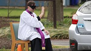 In the name of the father, and of the son, and of the holy spirit. Priest Offers Drive Thru Confession During Coronavirus Pandemic Abc News