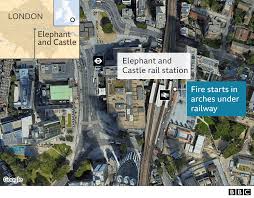 London fire brigade said around 100 firefighters were battling the blaze, and that three railway arch units, six cars and a telephone box were all on fire. 9vjx7fbezew2fm