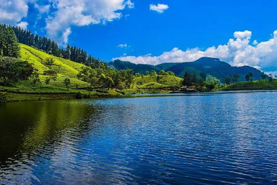 Sembuwatta Lake Elkaduwa Matale hilltop forest reservoir pine trees Sri Lanka