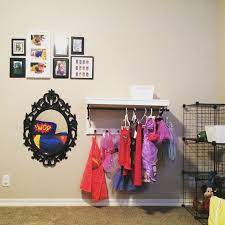 Cosplay Corner For A Toddler Room Hat Rack And Mirror From Ikea Frames From Ikea And Dollar Store Wire Shelves Add Sto Superman Room Purse Storage Toy Rooms