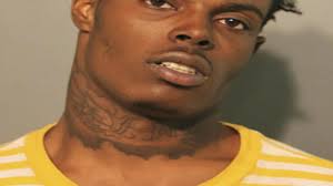 Two men charged in fatal Chicago shopping district shooting