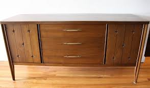This was manufactured by broyhill from their premier saga line. Broyhill Saga Picked Vintage