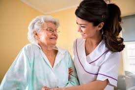Care Of The Elderly At Nursing Home Nurse Helps To Senior Women To Walk Sponsored Nursing Home Care Eld Nursing Home Nursing Home Care Elderly Care