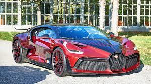 The windscreen wipers are carbon fibre. Unique Bugatti Divo Lady Bug Wears Wild Custom Paint Scheme