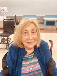 Four-wheeled mobility scooters for uneven terrain