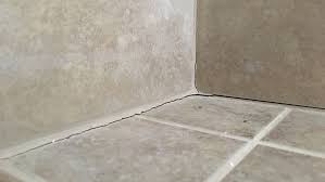 Avoid Cracked Grout Caulk Tile Shower Corners Shower Tile Grout Repair Bathroom Grout