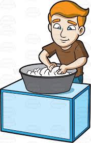 A Man Scrubbing The Clothes That He Is Washing Black Bucket Brown Shirt Man