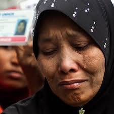 Refugees in Malaysia worry government tracking system a 'trap'