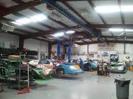 Our biggest seller is hydraulic floor jacks, which is the staple of any auto shop or home garage. Metal Auto Shop Buildings Mechanic Garages