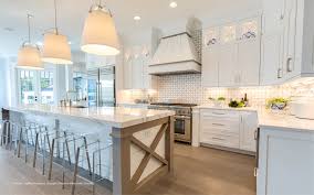 You can highlight features of your kitchen like cabinets or artwork by leading. Progress Lighting