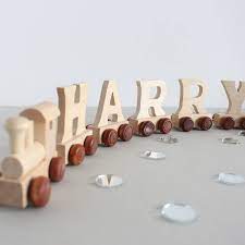 We know raising kids can be hard. Personalised Wooden Name Train And Gift Bag By The Little Blue Owl Notonthehighstreet Com
