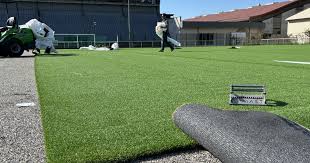 Photo Annecy. Parc des sports : une ?pelouse du futur? posée sur un des ...