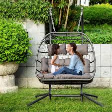 Featuring a playful yet elegant basket chair and simple hanging stand, this charming accessory not only gives your patio a refreshing transitional look but also offers incredible comfort. Kom Luxury 2 Person X Large Double Swing Chair Wicker Hanging Egg Chair Amazon Ca Patio Lawn Garden