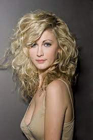 Many flattering cuts try to draw attention away from the jawline, so it's important to take note of where your curls are falling and how they're being shaped around the face. Curly Hairstyle For Long Face Novocom Top
