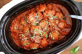 Step 2 in a slow cooker, mix the spaghetti sauce, crushed tomatoes, and tomato puree. Slow Cooker Italian Meatballs Tasty Kitchen A Happy Recipe Community