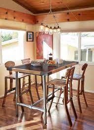 Nathan james 41202 viktor dining set kitchen pub table marble top fabric seat wood base, light gray/dark brown. Pub Style Dining Table Clever Collective