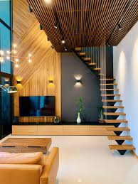 High Ceiling Feature Wall Van Hus Interior Design High Ceiling Living Room Feature Wall Living Room Accent Walls In Living Room