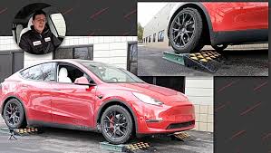 Firstly if your car is awd then car company will specify it on its body as awd or 4wd. Video Does Tesla Build A Good Awd System We Find Out With A Model Y The Fast Lane Car