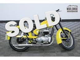 Image result for Sportsman Yellow 1952 Motorcycle