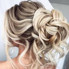 This mother of the bride chose a unique, curled hairstyle to show off her beautiful drop earrings and illusion neckline. 50 Unforgettable Wedding Hairstyles For Long Hair Hair Motive