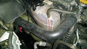 The 2003 toyota camry coolant temperature sensor can be found on top of the engine. Coolant Leak Pics Tacoma World