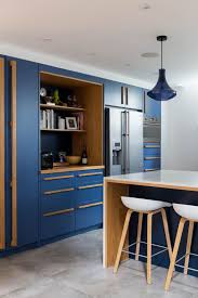 11 Ways You Never Thought To Update Your Kitchen Cabinets Hunker Simple Kitchen Remodel Dark Wood Kitchen Cabinets White Modern Kitchen