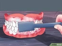 Soak dentures overnight using a denture stain remover. 3 Ways To Keep False Teeth White Wikihow