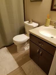 Even a toilet paper holder can add to the style of the space if chosen correctly. Back Of Toilet Decor