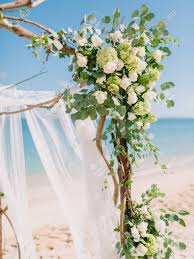 Check spelling or type a new query. Details Of Wedding Arch With White Flowers At Blue Ocean In Tropical Island Wedding Ceremony Stock Photo Picture And Royalty Free Image Image 115444354